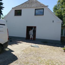 renovierte Fassade eines alten Hauses